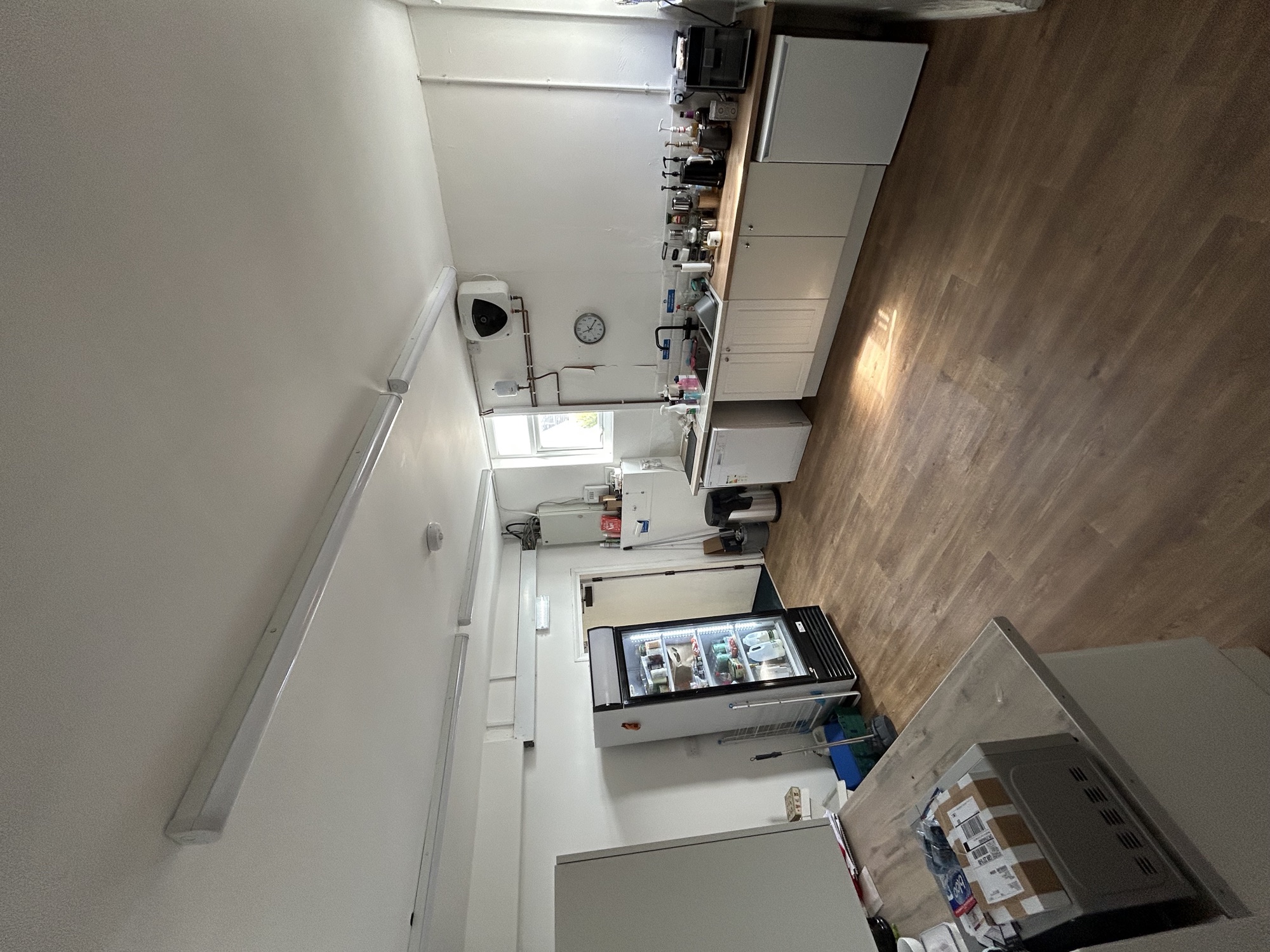 The club kitchen with coffee machines and counters, where Cups and Cakes runs